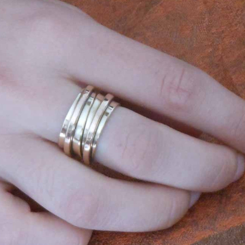 bague réglable en bronze décorée d’un fil soudé