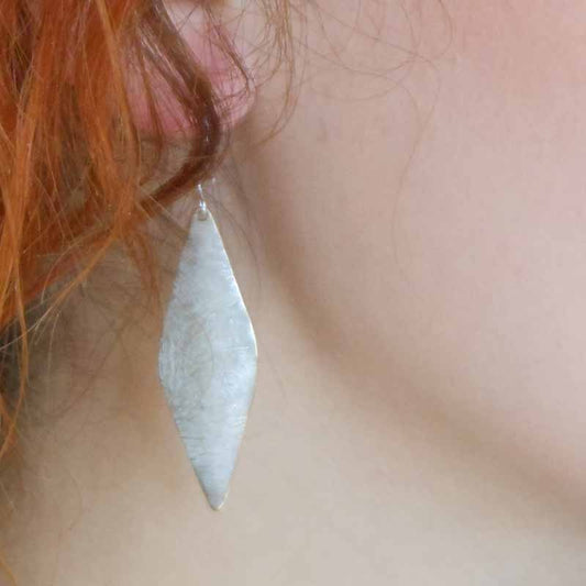 boucles d’oreilles en bronze et argent en forme de losange