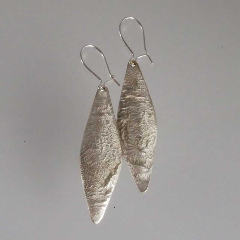 boucles d’oreilles en bronze et argent en forme de losange 