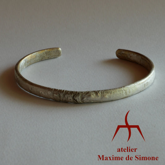 bracelet fin en bronze et argent travaillé à la température de fusion