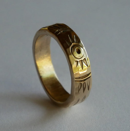 bronze ring engraved with plant and solar motifs for men and women