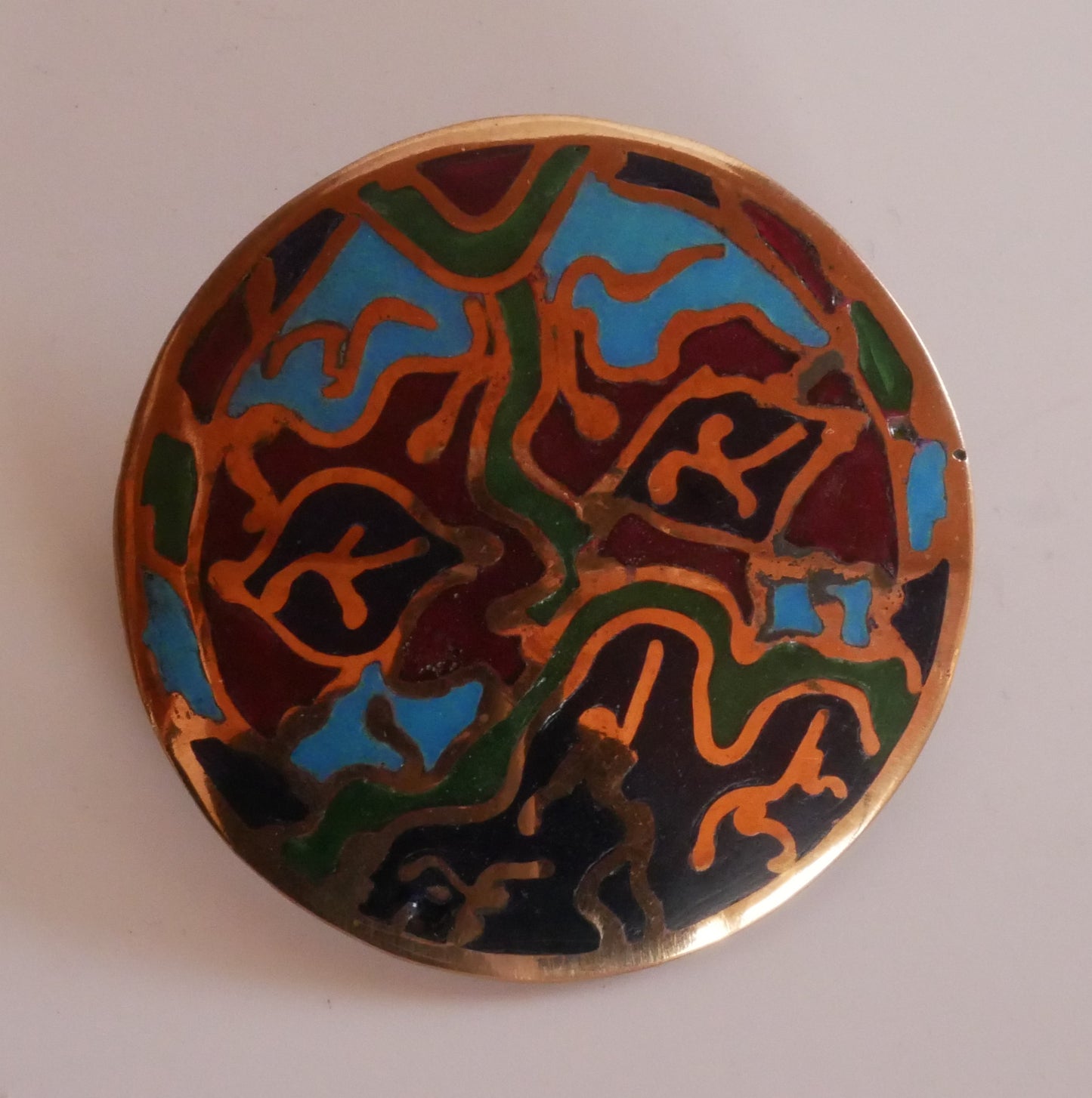 broche en bronze ronde émaillée