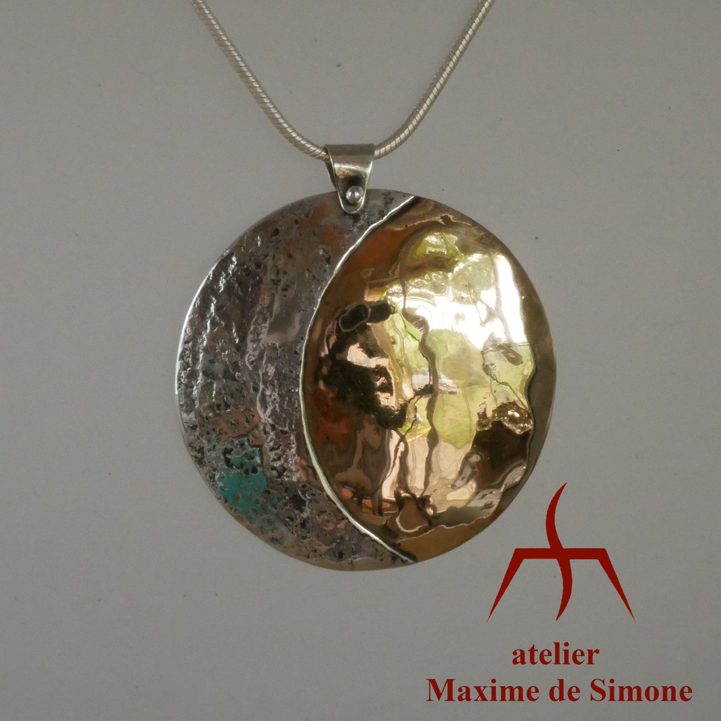 pendentif soleil en bronze et lune martelée en argent