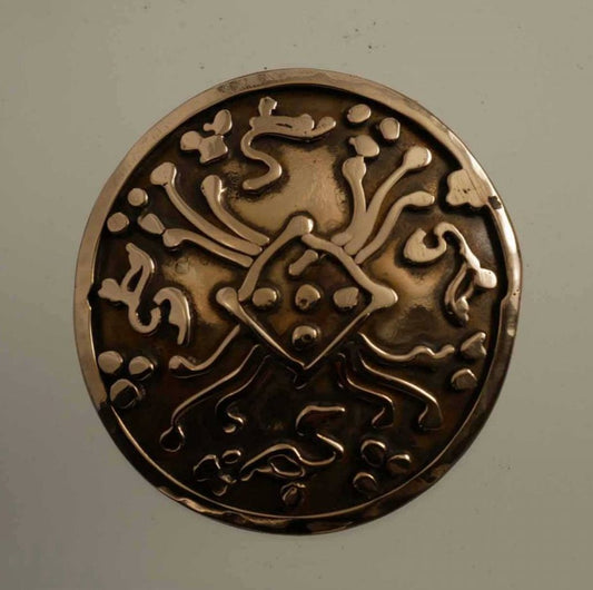 Broche en bronze décorée de motifs soudés originaux