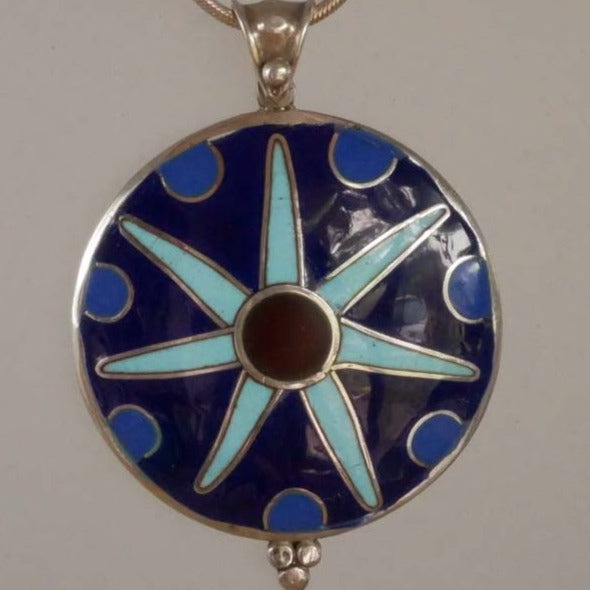 circular pendant in enamelled silver